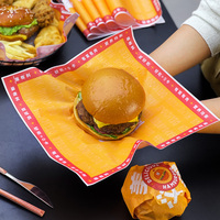 Papier d'emballage pour hamburgers écologique et résistant à la graisse, personnalisable avec logo, idéal pour les boulangeries, restaurants et emballages à emporter pour la restauration rapide.