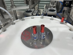 YB-Y2 Machine de remplissage et de vissage de vernis à ongles la plus vendue, <span class=keywords><strong>prix</strong></span> direct usine. Équipé d'un dispositif anti-goutte et anti-fuite - Product Image 6