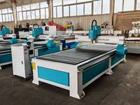 Machine de découpe CNC EVA SW1530 à broche unique 3 axes pour la conception de portes en bois dans les industries publicitaires, fabriquée en Chine
