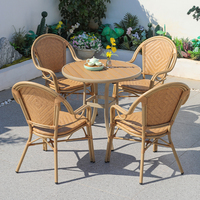Meubles de table à manger de jardin en rotin extérieur de conception moderne nordique ensembles de patio luxueux en fonte d'aluminium pour hôtels et parcs