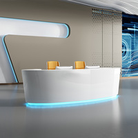 Comptoir de réception ovale en forme de voiture en marbre blanc et bleu à DEL Comptoir de spa en marbre artificiel de bonne qualité