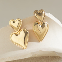 Boucles d'oreilles clous en métal double cœur pour femme, bijoux de mode élégants, accessoires quotidiens pour femme, cadeau