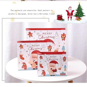 Sac en papier de Noël rouge laminé brillant en carton blanc de haute qualité avec poignée pour les promotions et les supermarchés - Product Image 2