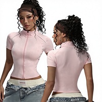 Veste de yoga pour femme respirante en spandex à manches courtes, coupe ajustée, avec design color-block, élégante et sportive, idéale pour l'entraînement et le fitness