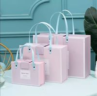 Boîtes à main pliantes personnalisées à prix de gros, boîtes cadeaux en papier pour mariage, boîtes d'emballage avec poignée et couvercle magnétique