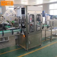 Étiqueteuse rétractable d'étiquettes adhésives pour petites bouteilles rondes à dessus plat à impression automatique