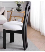Chaise de salle à manger, tabouret de bar rétro design noir, structure en bois massif, revêtement en tissu doux, mobilier luxueux et esthétique équilibré