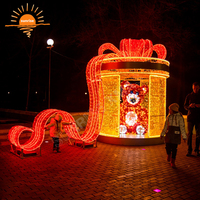 Boîte-cadeau interactive à LED avec motif lumineux pour la décoration de Noël en extérieur, les événements commerciaux et les projets de spectacle lumineux personnalisés pour les fêtes.