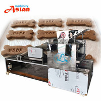 Machine automatique haute productivité pour la fabrication de 400 friandises pour animaux de compagnie, biscuits en forme d'os / machine à façonner les biscuits croustillants pour boulangerie