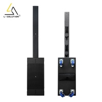 Système de sonorisation professionnel portable pour DJ extérieur, avec enceinte colonne active de grande série et 2 caissons de basses de 12 pouces