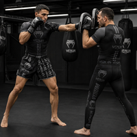 Ensemble MMA 3 pièces : Rashguard, Short de combat et Pantalon de compression gris effet usé. Logo personnalisé, OEM, ODM, faible MOQ, direct usine.