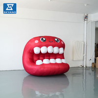 Modèle gonflable personnalisé de lèvres et de dents rouges de dessin animé pour la décoration d'événements de maquillage et d'expositions dentaires