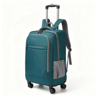 Sac à dos à roulettes Teal Softside avec bretelles rembourrées, poche avant zippée, poche latérale en maille, roues pivotantes