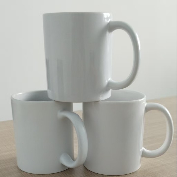 Taza blanca de capa de grado AA
