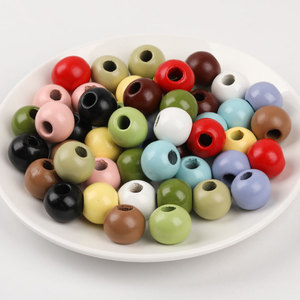 Perles en bois colorées à grand trou pour loisirs créatifs, décoration intérieure DIY, perles en vrac couleur bonbon, matériau pour arbre, procédé d'impression - Product Image 1