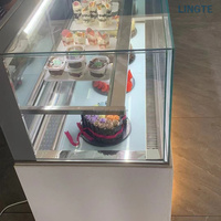 Étagères multi-niveaux pour boulangerie, vitrine réfrigérée pour desserts en mousse, refroidisseur à gâteaux avec finition marbrée