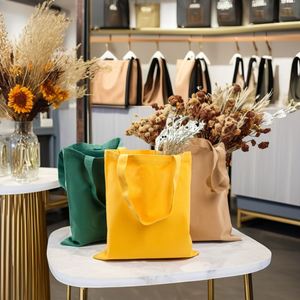 Vente directe usine : Sacs fourre-tout en toile de coton imprimés sur mesure, écologiques, avec poignées, pour cadeaux, emballage écologique tendance, de Ningbo - Product Image 2