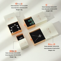 Boîte cadeau de luxe en papier carré avec tiroir coulissant, en stock, pour bijoux, avec ruban et doublure en éponge, impression quadricolore, pour bagues
