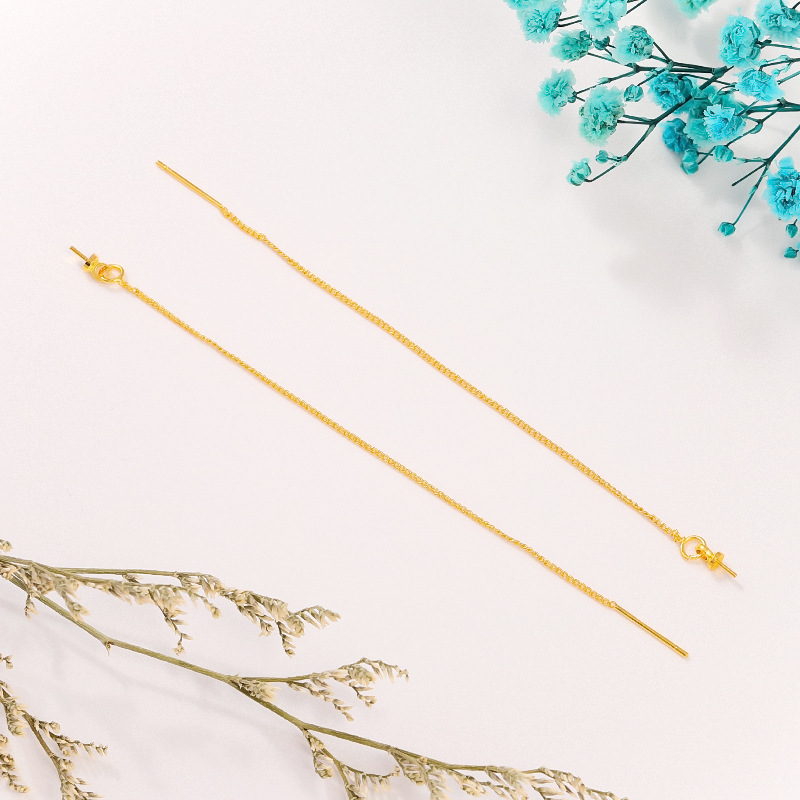 Pendientes de cadena densa con ojo de oveja en imitación de oro.