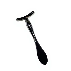 Varita masajeadora en metal en forma T para crema de ojos levanta y reafirma el rostro - Product Image 1
