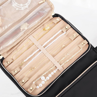 Organisateur de bijoux de voyage pliable, étui portable pour boucles d'oreilles et bagues avec fenêtres transparentes, fermeture éclair, noir