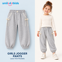 Smiledotkids Pantalon de jogging personnalisé pour enfants, gris, avec nœud, dentelle, bouton et cordon de serrage, poignets côtelés doux, OEM ODM, pour petites filles, vente en gros, nouveauté