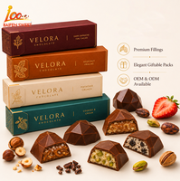 Vente en gros OEM/ODM de snacks au chocolat exotiques de haute qualité, chocolat au lait noisette et raisins secs