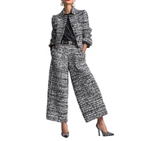 Nouvelle chemise élégante à manches longues pour femme, style européen et américain, en velours à carreaux, version classique, infroissable, collection 2026