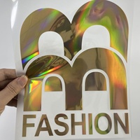 Vente en gros usine : Appliques holographiques de haute qualité pour vêtements, motifs en film PET, prêts à expédier, impression par transfert thermique, longue durée de lavage, finition lisse