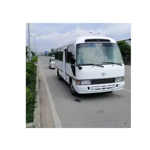 Beyaz dizel tur otobüsü toyota coaster otobüs 23-30seats en iyi fiyata LHD japonya antrenör okul otobüsü satılık manuel