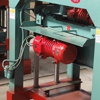 Machine automatique de fabrication de blocs de béton WanJun 4-35C avec réducteur, trémie à chaîne et vibration de moule