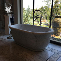 Décor de luxe Salle de bain Baignoires en marbre autoportantes Baignoire en pierre naturelle de style occidental sculptée à la main