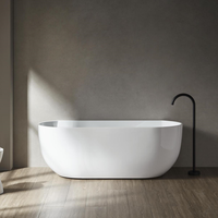 Baignoire autoportante ovale moderne HOTAQI en acrylique noir mat avec drain central, garantie 5 ans pour projets hôteliers personnalisés