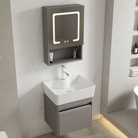 Zeitgenössischer Schwebender Edelstahl-Badezimmerschrank Poliertes Keramikwaschbecken Soft-Close-Schublade 3-Farben Hintergrundbeleuchteter LED Smart-Spiegel