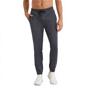 Pantalon de survêtement gris foncé pour homme avec taille élastique et poches latérales, décontracté, en polyester mi-lourd - Product Image 1