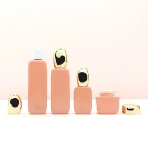 Contenedores de botellas de bomba de loción de embalaje cosmético cuadrado único de nuevo diseño y tarros de vidrio con tapa dorada