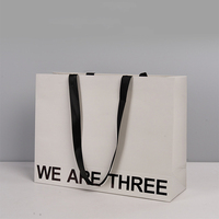 Sacs à provisions de logo personnalisé d'estampage de feuille d'argent de luxe sacs en carton blanc écologique ruban pour des promotions personnalisées votre