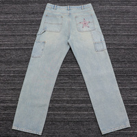 Jean cargo vintage personnalisé avec patchwork drapeau américain, denim rétro coupe droite avec rayures cloutées et broderie étoile