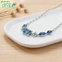 Collier de clavicule en acier inoxydable 316 avec revêtement PVD or épais de 3 microns maximum, perles incrustées de grand zircon bleu et breloque