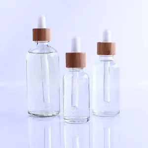 Wholesale competitive price transparent 30ml essential oil glass dropper bottle with bamboo lid