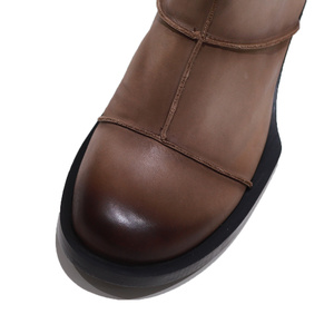Vente en gros de bottines en cuir véritable doublées de fourrure pour femmes avec semelle épaisse fermeture éclair latérale tendance confortable - Product Image 4