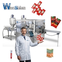 Machine de remplissage et d'emballage automatique pour sachets préformés de sauce tomate et de liquide vaisselle, machine d'emballage de sauce en bâtonnets pour sachets de forme.