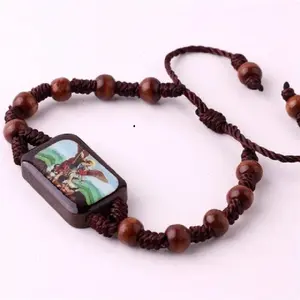 Bracelet en perles de bois tricoté avec icône de Saint-Michael religieux