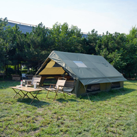 Qualité du fabricant 12 ㎡   Tente de camping gonflable avec fenêtre de toit et cheminée, résistante au vent et imperméable