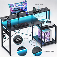 Bureau de jeu en forme de L avec éclairage LED, prises de courant et étagère de rangement, poste de travail informatique réversible en fibre de carbone
