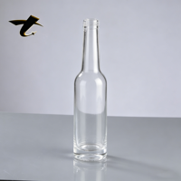Bouteilles de vin rondes en verre transparent, vente en gros à prix d'usine pour whisky, tequila, brandy, boissons énergisantes avec bouchon en liège