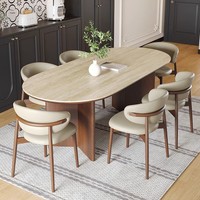 Table à manger de style mi-siècle en bois massif, vintage et minimaliste, avec plateau en pierre veinée d'onyx, de forme ovale, design français pour les petites maisons