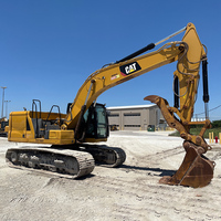 Excavatrice CAT 320 d'occasion pour travaux de terrassement, construction routière, creusement de fossés, chargement de camions et assistance en carrière