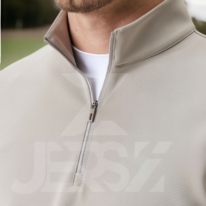 . Zip de golf pour hommes et femmes conçu pour la flexibilité du swing et la respirabilité dans des conditions chaudes ou fraîches adaptées - Product Image 1