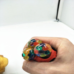 Venta al por mayor de fábrica: Pelotas antiestrés de dinosaurio de alta calidad, personalizables, de malla, para aliviar el estrés, y pelotas de uva para apretar. - Product Image 6